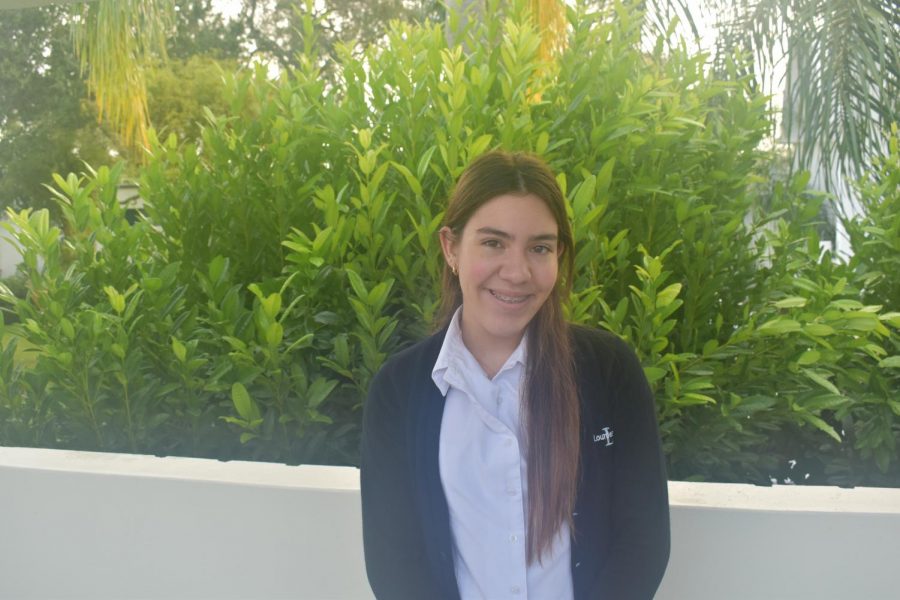 Junior Fiorella Lara is a believer in the power of electric cars.