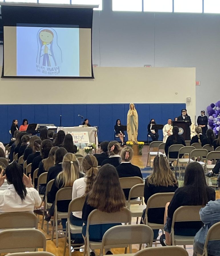 Friday, Feb. 11: The school celebrated mass as a community for Our Lady of Lourdes Feast Day during Focus. Everyone on campus was given a bracelet with the miraculous medal to commemorate the schools feast day.