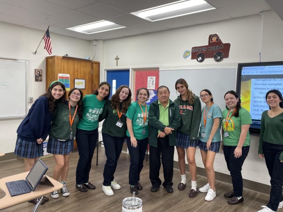Thursday March 17: The school dresses in green for luck on St. Patricks Day. Deacon Louis and his B3 sophomore Theology class show some Irish spirit.