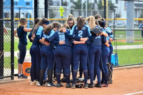 Our Lady of Lourdes Academys Varsity Softball team preparing before taking on the Terra Wolfs on their third game of the season. 