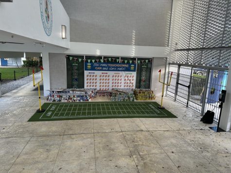 Cans were collected and placed along the football field set up 