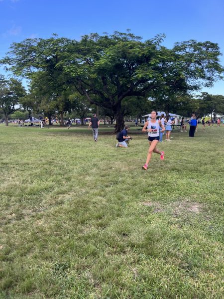Freshman Alessandra Perez races to the finish line and wins the race.
