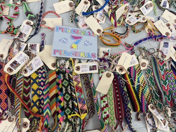 Pulsera bracelets sold for a cause.