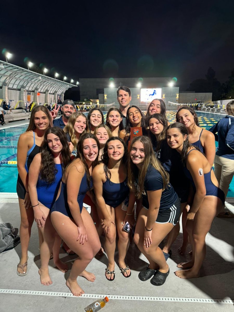 Swimming team places second at the District meet in Belen Jesuit. 