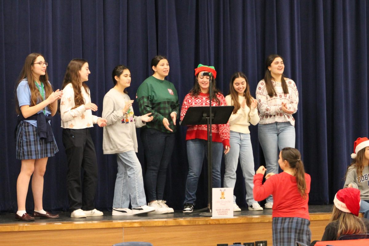 The Lourdes Singers hosted a karaoke station in the cafeteria and sang all our favorite songs, senior Sofia Delgado said. 