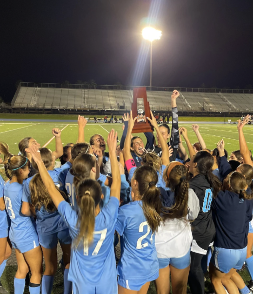 DISTRICT CHAMPS: After defeating Varela 9-0, these soccer superstars rejoiced and celebrated their win as a team. On January 31st at the Tropical Park stadium, these girls brought home another trophy to add to the Lourdes soccer collection and made both their coaches and families incredibly proud. “One of my favorite parts about coaching is seeing the smiles on these girls faces when they achieve their goals and accomplish things as a team,”  head coach, David Fique said. 