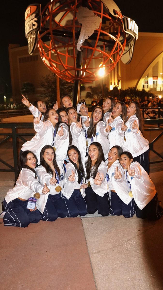 The School Dance team celebrating their big win in Orlando.