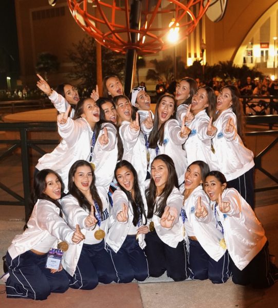 The School Dance team celebrating their big win in Orlando.